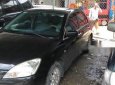 Mitsubishi Lancer 2003 - Cần bán lại xe Mitsubishi Lancer 2003, màu đen