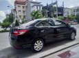 Toyota Vios E 2015 - Bán ô tô Toyota Vios E sản xuất năm 2015, màu đen, xe đẹp