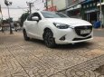 Mazda 2 1.5 AT 2016 - Bán Mazda 2 1.5 AT năm sản xuất 2016, màu trắng, xe còn rất mới