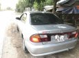 Mazda 323 2001 - Cần bán xe Mazda 323 đời 2001, màu bạc 