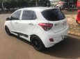 Hyundai Grand i10   2014 - Bán Hyundai Grand i10 đời 2014, màu trắng, 335 triệu