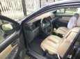 Toyota Corolla altis 2005 - Cần bán lại xe Toyota Corolla altis đời 2005, màu đen, 313tr