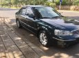 Ford Laser 1.8 Ghia 2003 - Cần bán xe Ford Laser 1.8 Ghia sản xuất năm 2003, màu xanh lam 