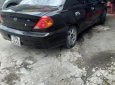 Kia Spectra 1.6 MT 2005 - Cần bán xe cũ Kia Spectra 1.6 MT sản xuất năm 2005, màu đen