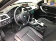 BMW 3 Series 20i3 2013 - Bán xe BMW 3 Series 320i đời 2013 màu đen, nội thất đen cực sang