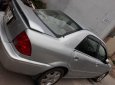 Ford Laser GHIA 1.8 MT 2003 - Cần bán lại xe Ford Laser GHIA 1.8 MT 2003, màu bạc 