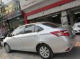 Toyota Vios 1.5E 2015 - Bán Toyota Vios 1.5E năm 2015, màu bạc số sàn