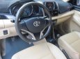 Toyota Vios 1.5E 2015 - Bán Toyota Vios 1.5E năm 2015, màu bạc số sàn