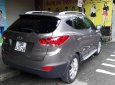 Hyundai Tucson 2.0 AT 4WD 2011 - Cần bán Hyundai Tucson 2.0 AT 4WD năm 2011, màu xám, xe nhập  