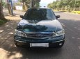 Ford Laser 1.8 Ghia 2003 - Cần bán xe Ford Laser 1.8 Ghia sản xuất năm 2003, màu xanh lam 