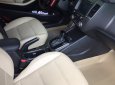 Kia Cerato 2.0AT 2016 - Bán Kia Cerato 2.0AT màu đen VIP số tự động, sản xuất 2016, lăn bánh đúng 12000km