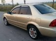 Ford Laser  1.8MT 2003 - Cần bán Ford Laser 1.8MT năm 2003, màu vàng chính chủ giá cạnh tranh