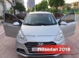 Hyundai Grand i10 MT 2018 - Cần bán gấp Hyundai Grand i10 MT 2018, màu bạc đẹp như mới