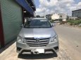 Toyota Innova E 2014 - Bán xe Toyota Innova E đời 2014, màu bạc xe gia đình