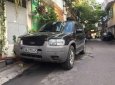 Ford Escape 3.0 V6 2004 - Cần bán lại xe Ford Escape 3.0 V6 đời 2004, màu đen số tự động