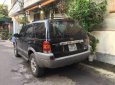 Ford Escape 3.0 V6 2004 - Cần bán lại xe Ford Escape 3.0 V6 đời 2004, màu đen số tự động