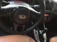 Kia Forte   2009 - Bán xe Kia Forte đời 2009, màu đen số tự động, giá tốt