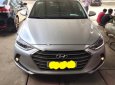 Hyundai Elantra 2.0 AT 2016 - Cần bán lại xe Hyundai Elantra 2.0 AT sản xuất năm 2016, màu bạc  