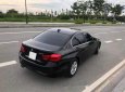 BMW 3 Series  320i  2017 - Bán xe BMW 320i năm 2017, màu đen như mới