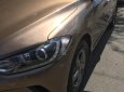 Hyundai Elantra 1.6MT 2016 - Bán xe Elantra 1.6 MT 2016, màu vàng cát