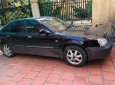 Daewoo Magnus 2003 - Bán Daewoo Magnus năm 2003, màu đen, nhập khẩu  