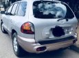 Hyundai Santa Fe 2004 - Cần bán lại xe Hyundai Santa Fe năm 2004, màu bạc