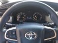 Toyota Innova   2.0 E 2016 - Bán Toyota Innova 2.0 E năm sản xuất 2016, màu bạc số sàn