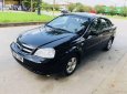 Daewoo Lacetti   2009 - Bán xe Daewoo Lacetti đời 2009, màu đen xe gia đình, giá chỉ 180 triệu