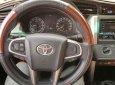 Toyota Innova  E   2017 - Bán Toyota Innova E đời 2017, màu bạc số sàn