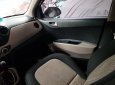 Hyundai Grand i10   2014 - Cần bán gấp Hyundai Grand i10 đời 2014, màu trắng còn mới, giá chỉ 255 triệu