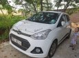 Hyundai Grand i10 2014 - Cần bán Hyundai Grand i10 đời 2014, màu trắng số tự động