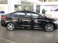 Hyundai Elantra 1.6 Tubo 2018 - Cần bán lại xe Hyundai Elantra đời 2018 màu đen, giá 729 triệu, xe có sẵn giao ngay