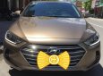 Hyundai Elantra 1.6MT 2016 - Bán xe Elantra 1.6 MT 2016, màu vàng cát