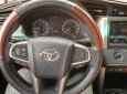 Toyota Innova 2.0E 2016 - Cần bán xe Toyota Innova 2.0E sản xuất 2016, màu bạc như mới