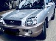 Hyundai Santa Fe 2004 - Cần bán lại xe Hyundai Santa Fe năm 2004, màu bạc