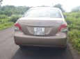 Toyota Vios 2009 - Bán Toyota Vios sản xuất 2009, màu vàng xe gia đình