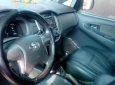 Toyota Innova 2.0E 2013 - Cần bán gấp Toyota Innova 2.0E sản xuất năm 2013, màu bạc, xe gia đình