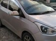 Hyundai Grand i10 2014 - Chính chủ bán xe Hyundai Grand i10 2014, màu bạc, xe nhập