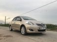 Toyota Vios E 2011 - Cần bán Toyota Vios E sản xuất năm 2011, màu vàng