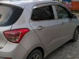 Hyundai Grand i10 2014 - Chính chủ bán xe Hyundai Grand i10 2014, màu bạc, xe nhập