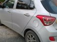 Hyundai Grand i10 2014 - Chính chủ bán xe Hyundai Grand i10 2014, màu bạc, xe nhập