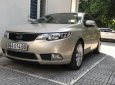 Kia Forte   1.6 MT  2011 - Chính chủ bán Kia Forte 1.6 MT 2011, màu vàng cát