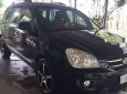 Kia Carens 2010 - Cần bán xe Kia Carens sản xuất năm 2010, màu đen, 320 triệu