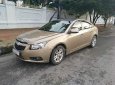 Chevrolet Cruze LS 1.6 MT 2014 - Bán ô tô Chevrolet Cruze sản xuất 2014, đăng ký 2015 màu vàng cát