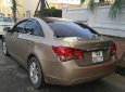 Chevrolet Cruze LS 1.6 MT 2014 - Bán ô tô Chevrolet Cruze sản xuất 2014, đăng ký 2015 màu vàng cát