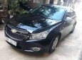 Chevrolet Cruze   MT 2010 - Cần bán xe Chevrolet Cruze MT sản xuất năm 2010, màu đen xe gia đình