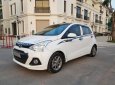 Hyundai Grand i10   2016 - Cần bán Hyundai Grand i10 năm sản xuất 2016, màu trắng, xe nhập chính chủ