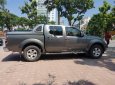 Nissan Navara LE 2.5MT 4WD 2013 - Bán Nissan Navara màu nâu, sx 2013 số sàn, hai cầu, máy dầu