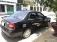 Daewoo Nubira 2002 - Cần bán xe Daewoo Nubira đời 2002, màu đen 