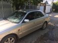 Mazda 626 2002 - Gia đình bán xe Mazda 626 sản xuất 2002, màu bạc  